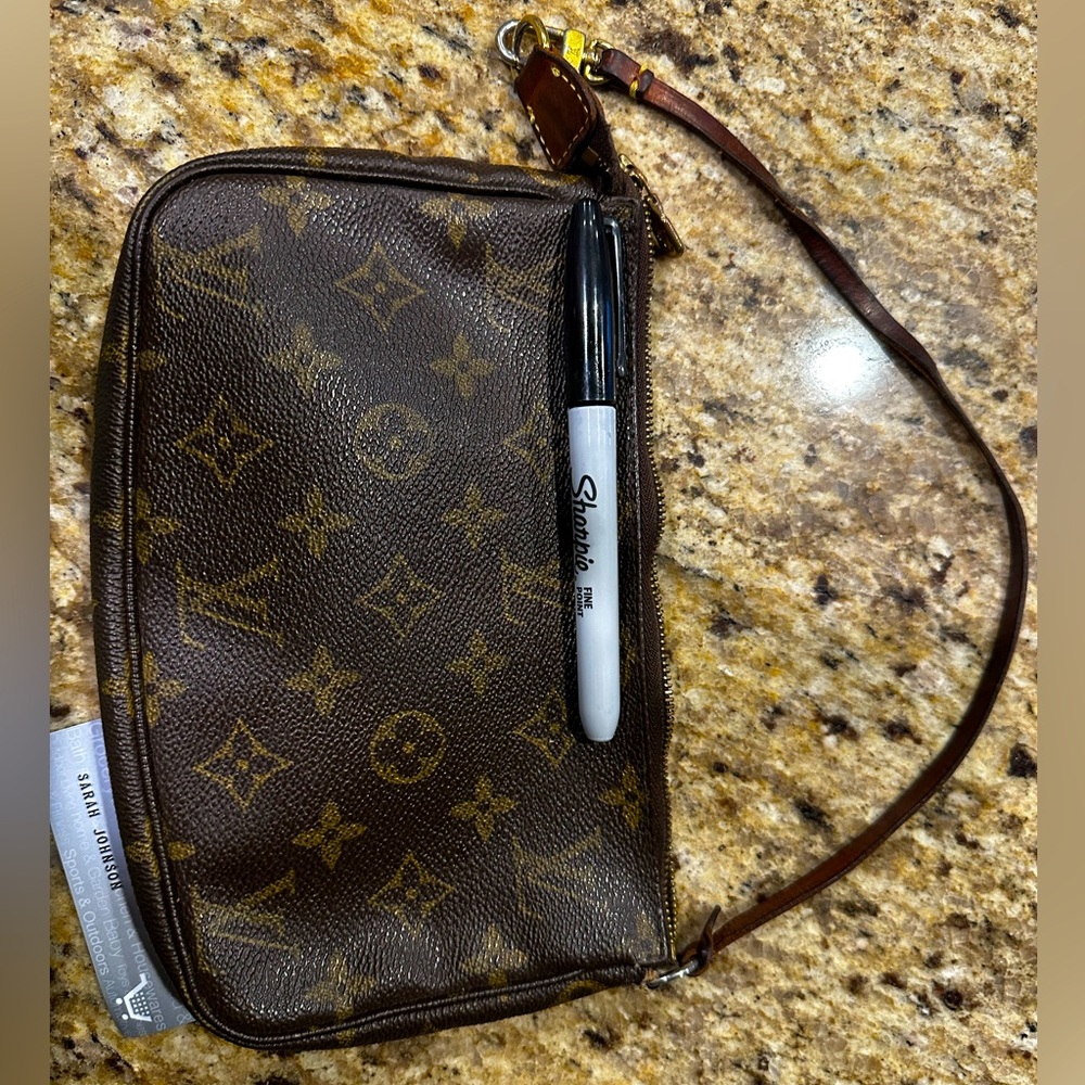 Used Louis Vuitton pochette.